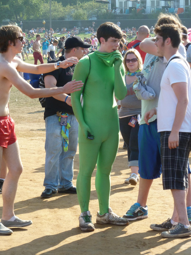 young man in a green morph suit