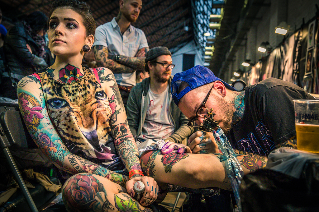 lady at a Brussels tattoo convention