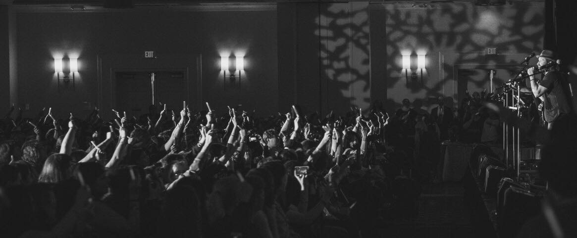 Fans watching a concert at one of the conventions